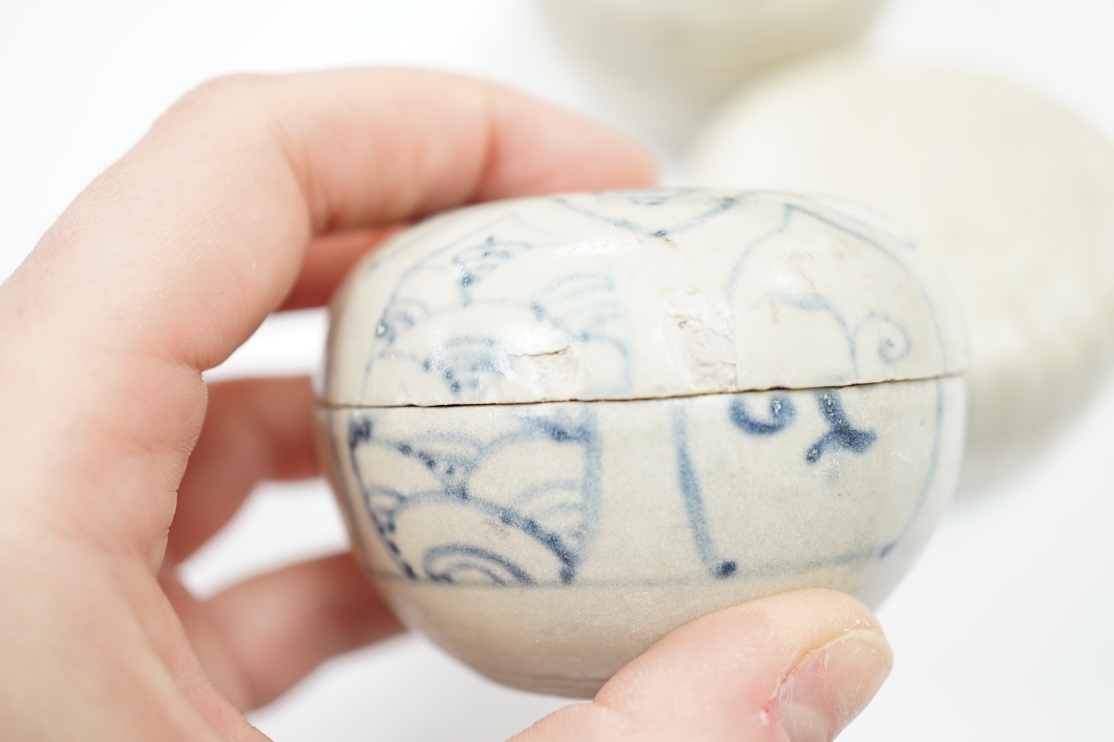 Two Annamese Chinese blue and white boxes and covers, 15th/16th century and a Dehua moulded box and cover, Ming dynasty